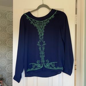 Blue blouse with light blue embroidery